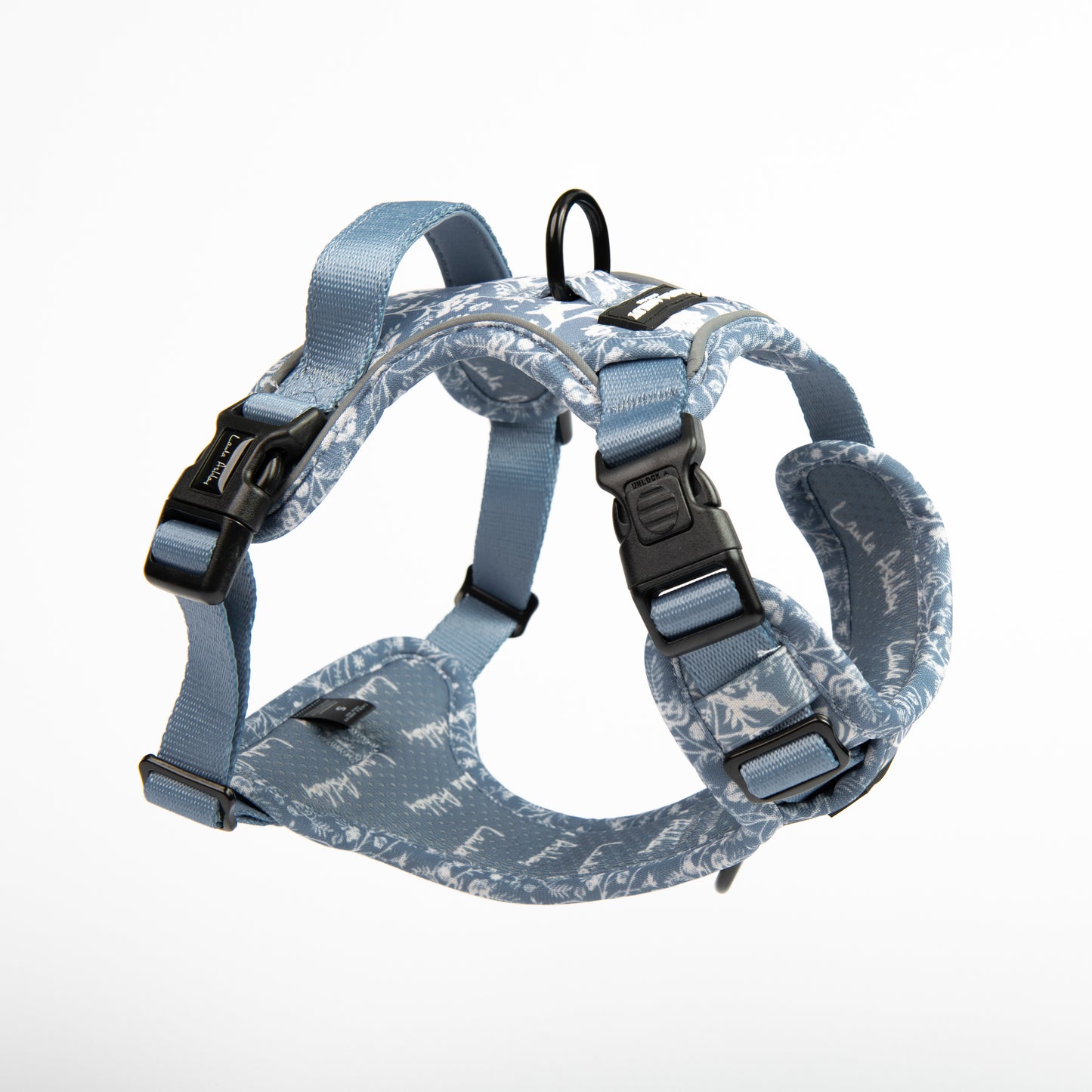 Dog harness with blue floral pattern on a white background