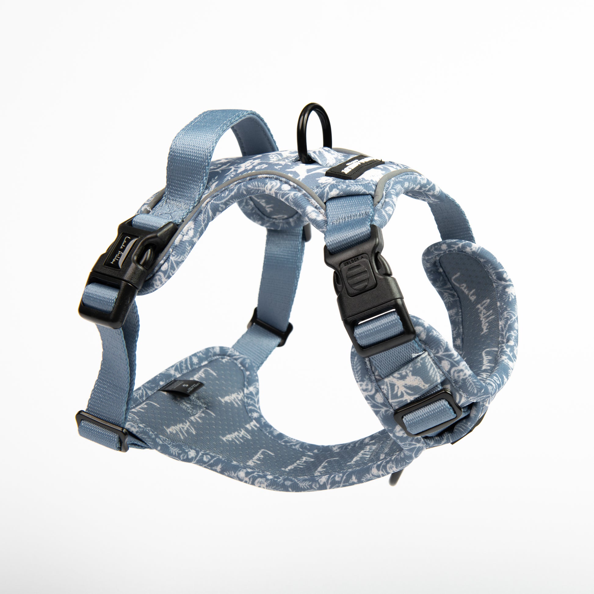 Dog harness with blue floral pattern on a white background