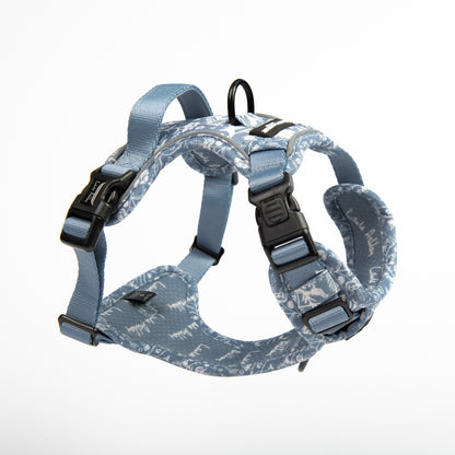 Dog harness with blue floral pattern on a white background