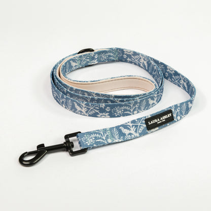 Blue Laura Ashley floral patterned dog leash with black hardware and branding on a white background