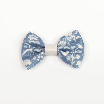 Blue and white floral bow tie on a white background