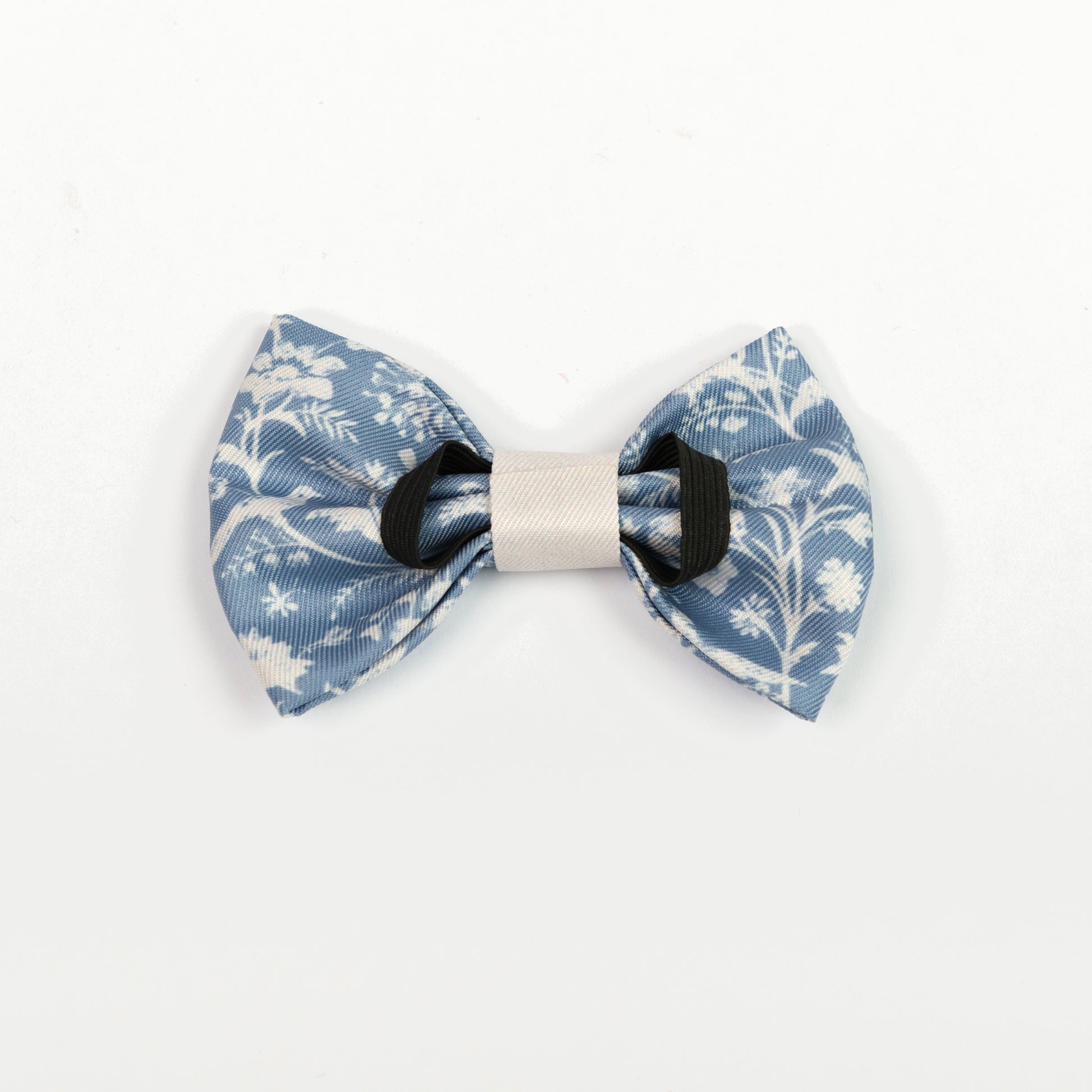 Blue and white floral dickie bow tie on a white background