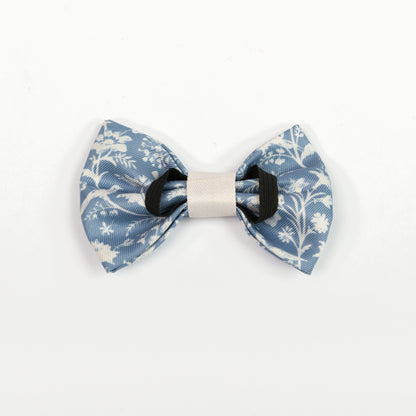 Blue and white floral dickie bow tie on a white background