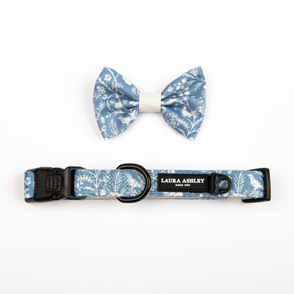 Dog collar and bow tie set with floral pattern on a white background, featuring Laura Ashley branding.