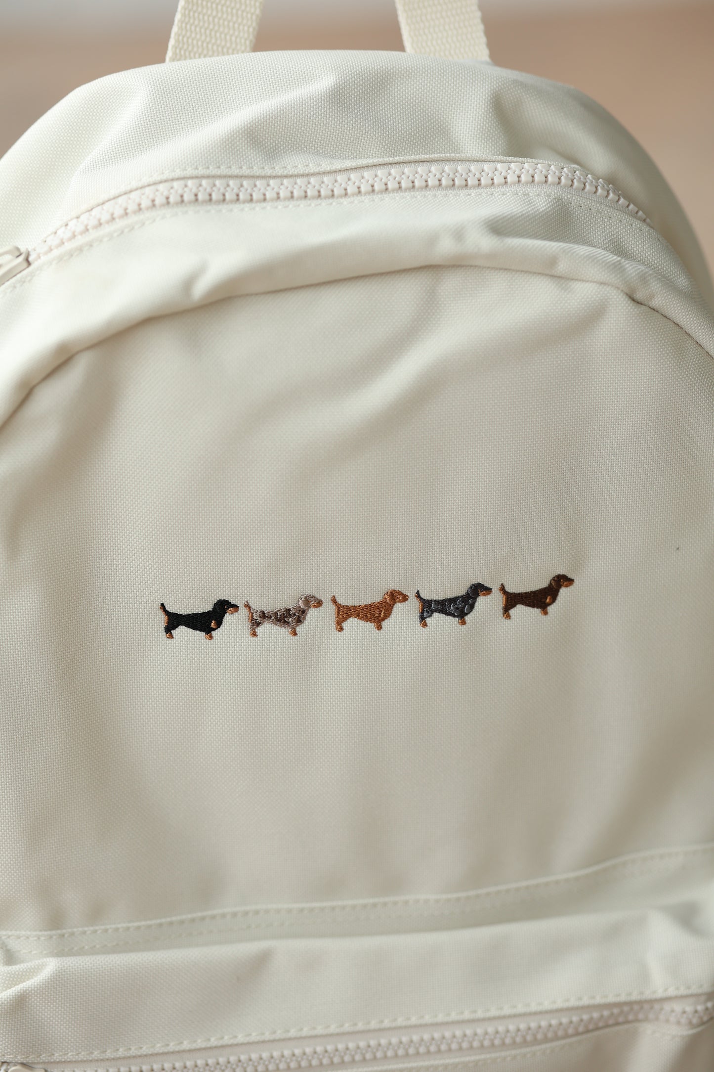 Cream Backpack - Five Embroidered Dachshunds - SAMPLE