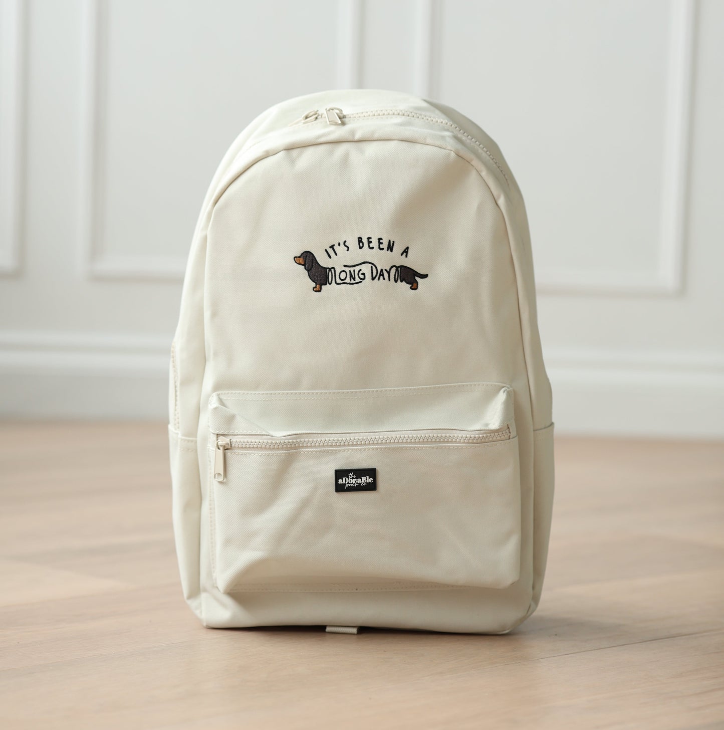 Cream Backpack - It's Been A Long Day - Black and Tan Dachshund - SAMPLE