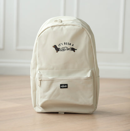 Cream Backpack - It's Been A Long Day - Black and Tan Dachshund - SAMPLE