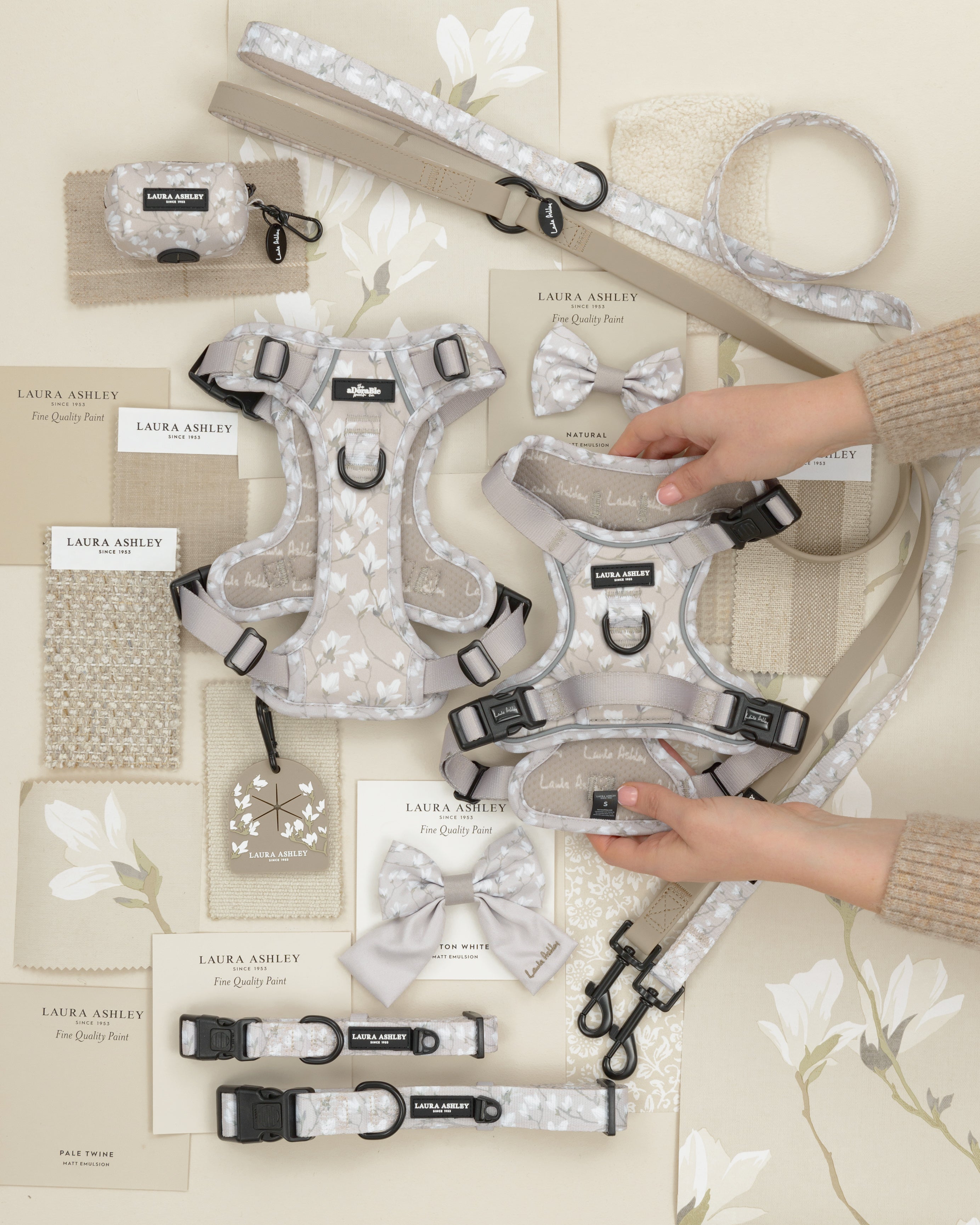 Magnolia Grove Laura Ashley dog accessories on a cream background of Laura Ashley patterned fabric and wallpaper