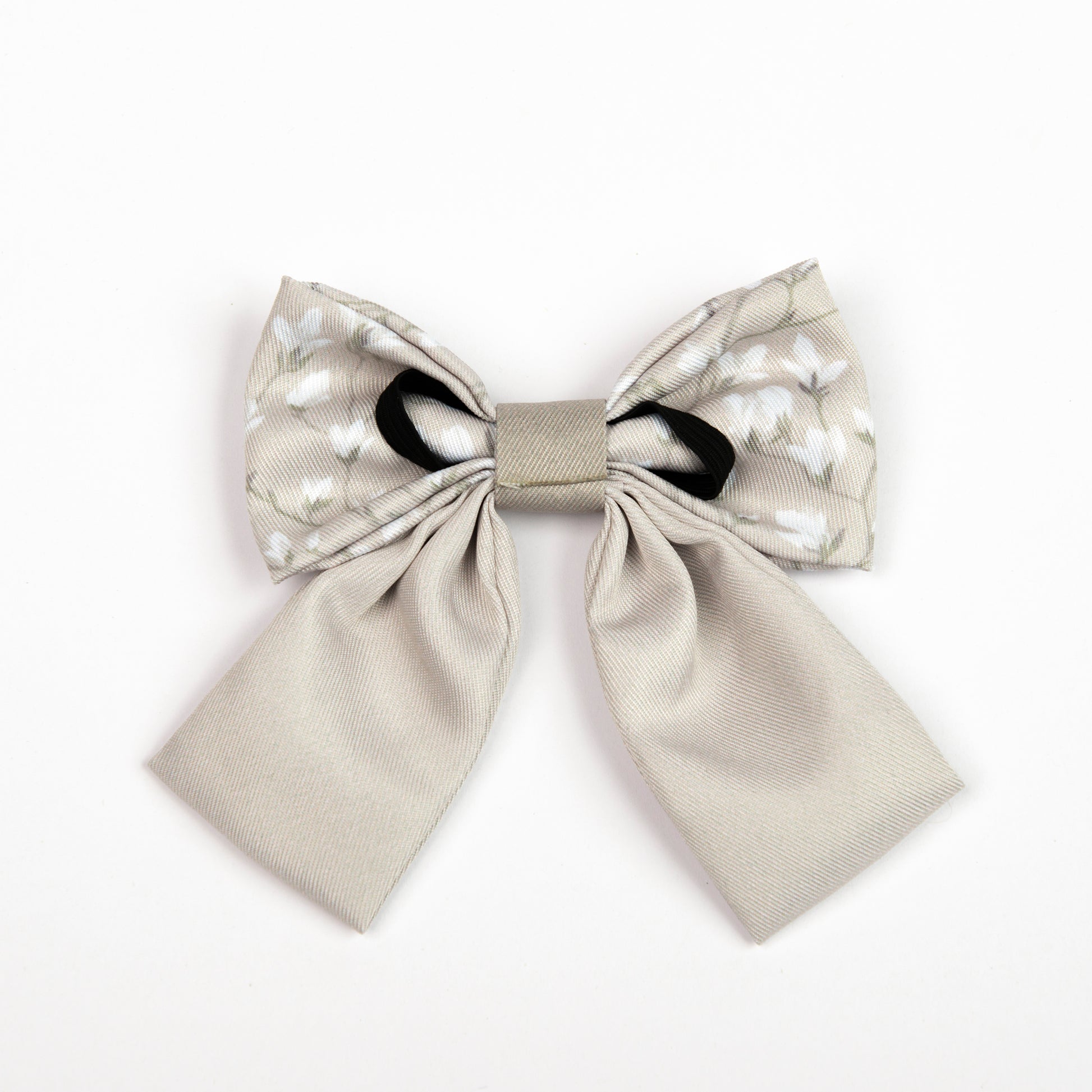 Beige dog sailor bow tie on a white background